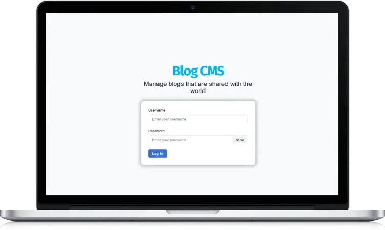Login page of a Blog CMS on a desktop monitor. It features fields for 'Username' and 'Password' with a 'Log In' button.